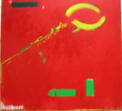 A lemon in  a basket of Strawberries